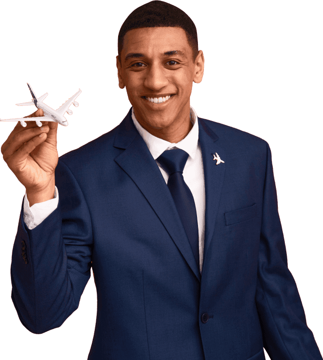 JIC immigration consultant holding a model aircraft